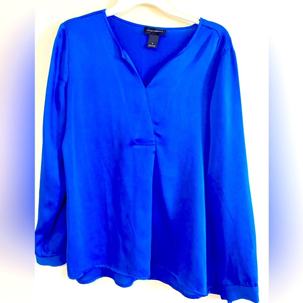 Investments electric blue blouse.